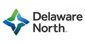 Delaware North logo featuring a blue and green geometric star symbol to the left of the company name in black text on a white background.