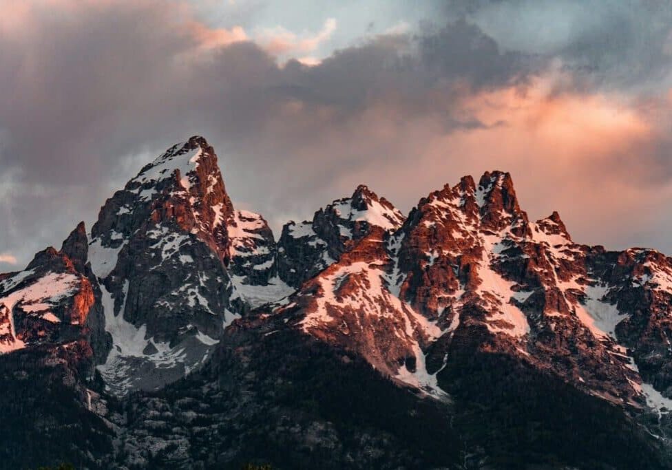 snow covered mountain during daytime