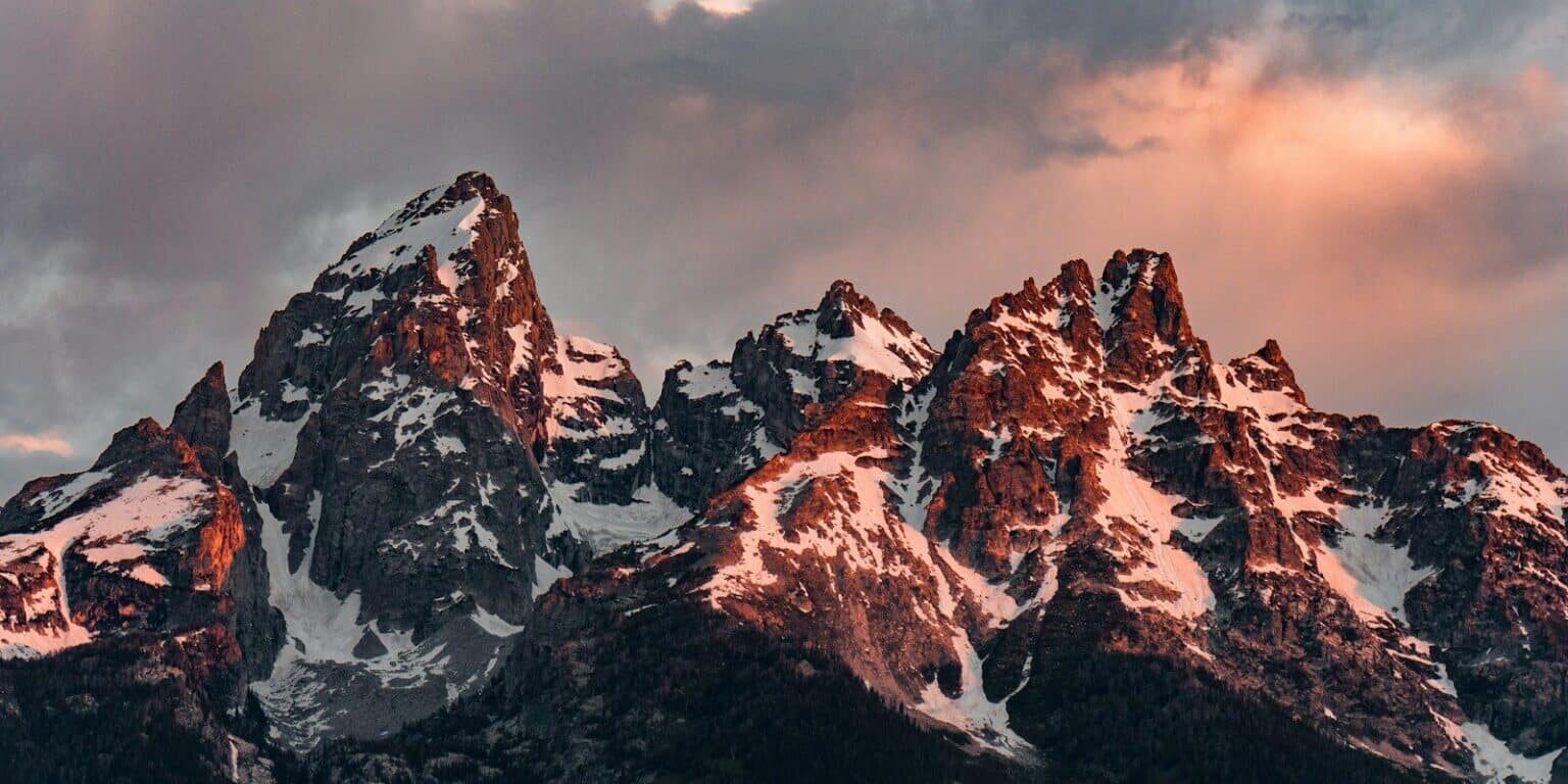 snow covered mountain during daytime